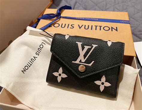 victorine wallet louis vuitton gold button|louis vuitton victorine wallet monogram.